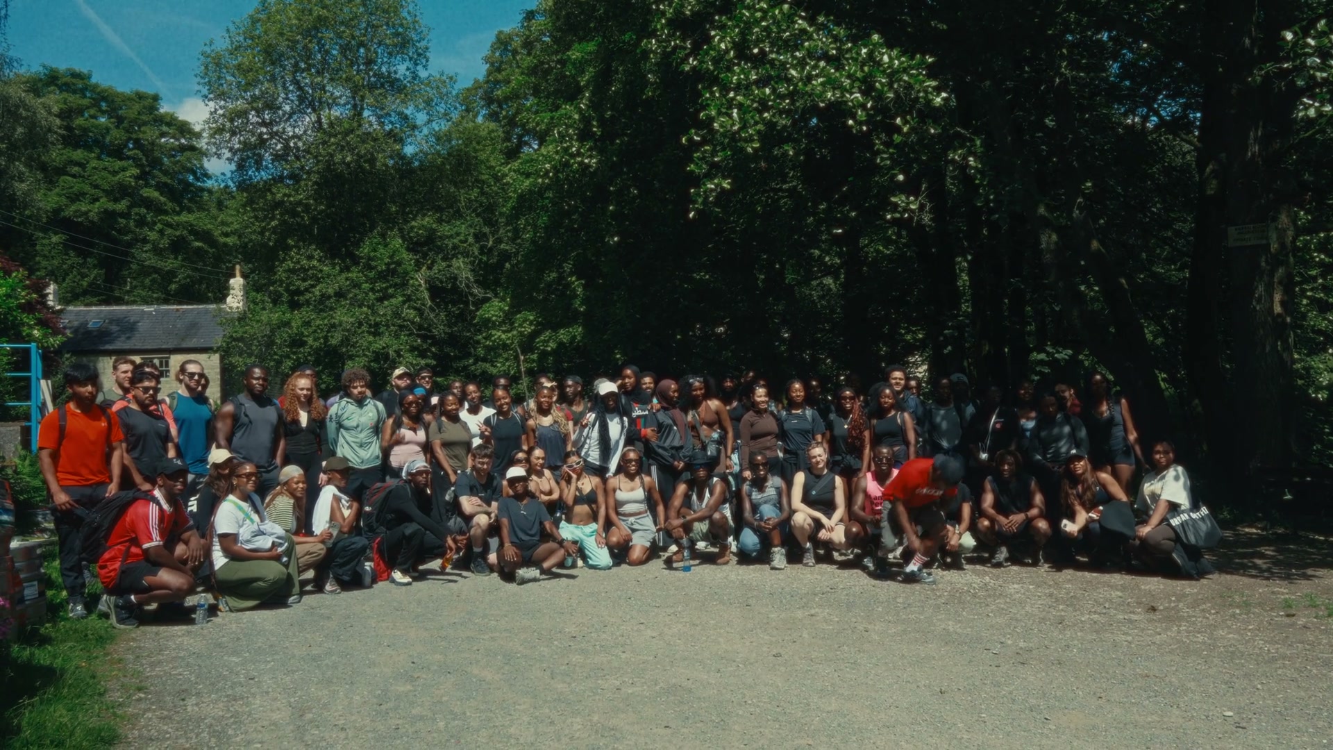 A large group gathered on the trail for the hike